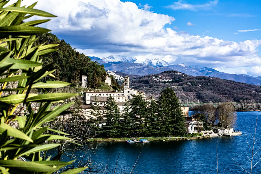 Lake Piediluco with snow on the mountains behind